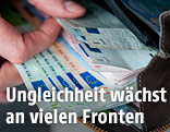 Geld in Geldtasche