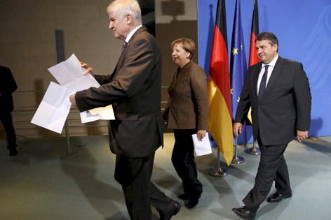 © Reuters/Fabrizio Bensch Angela Merkel, Sigmar Gabriel und Horst Seehofer
