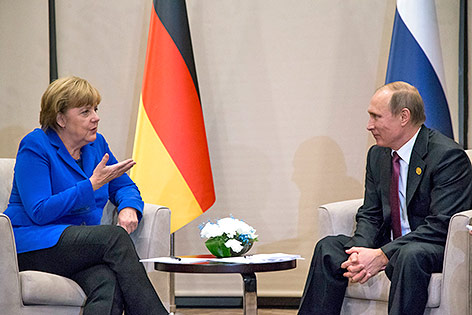 © APA/AP/Alexander Zemlianichenko Deutsche Bundeskanzlerin Angela Merkel und Russlands Präsident Wladimir Putin
