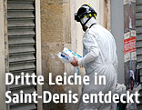 Ermittler begutachten Wohnung im Saint Denis