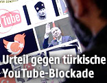 Mann vor Bildschirm