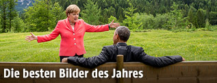 Angela Merkel talks und Barack Obama