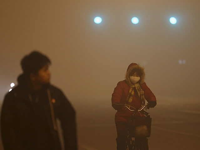 © Reuters Smog in Peking