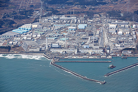 © picturedesk.com/AP/Yasushi Kanno Luftaufnahme zeigt das Kernkraftwerk Fukushima