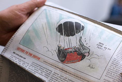 © ORF.at/Carina Kainz Zeitung mit Cartoon