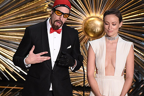 © APA/AFP/Mark Ralston Sacha Baron Cohen und Olivia Wilde