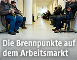 Arbeitslose am Arbeitsamt