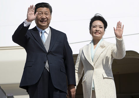 © Reuters/RIA Novosti Chinas Präsident Xi Jinping und seine Frau Peng