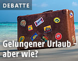 Reisekoffer am Strand