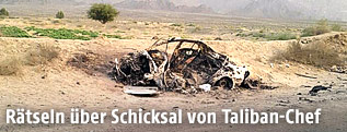 Zerstörtes Fahrzeug, in dem der Chef der Taliban, Mullah Achtar Mansur, gewesen sein soll