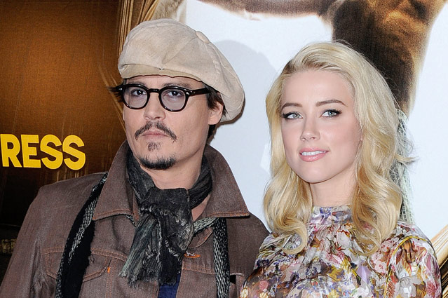 © Reuters/Gonzalo Fuentes Johnny Depp und Amber Heard posieren für den Film "The Rum Diary", 2011