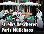 Müllberg vor einem Cafe in Paris