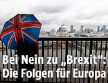 Mann mit britischem Regenschirm