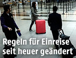 Reisende auf einem Flughafen