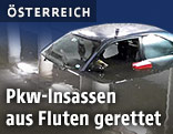 Auto in &uuml;berfluteter Unterf&uuml;hrung