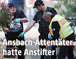 Polizisten am Tatort