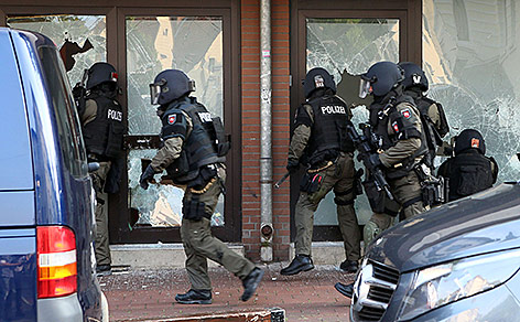 © APA/AFP/dpa/Chris Gossmann Deutsche Polizisten