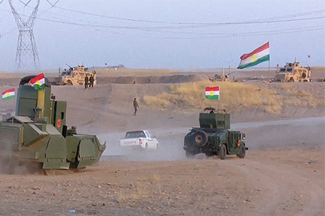 © APTN/Rudaw TV Soldaten der Peschmerga östlich von Mossul