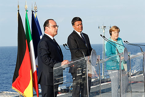 © Reuters/Remo Casilli Francois Hollande, Angela Merkel und Matteo Renzi