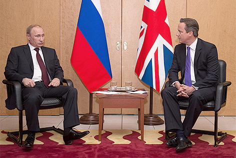 © ReutersStefan Rousseau Wladimir Putin und David Cameron