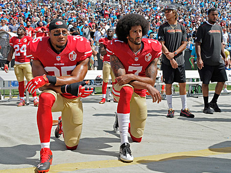 © AP/Mike McCarn Eric Reid u nd Colin Kaepernick