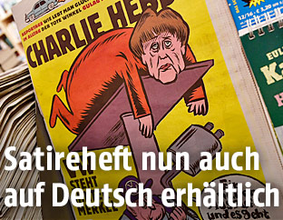 Deutschsprachige Ausgabe von Charlie Hebdo zeigt Angela Merkel auf der Titelseite