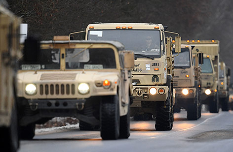 © APA/AFP/dpa/Ralf Hirschberger US-Militärfahrzeuge