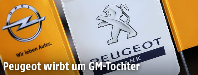Peugeot-Logo und Opel-Logo