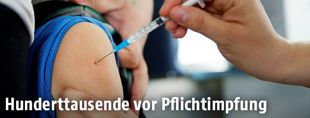 Kind wird geimpft