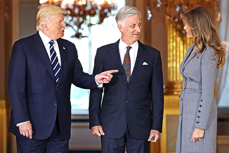 © APA/AFP/Benoit Doppagne US-Präsident Trump mit seiner Frau Melania und dem belgischen König Philippe