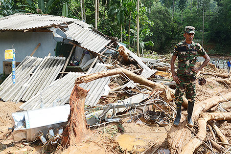 © APA/AFP/Lakruwan Wanniarachchi Zerstörtes Haus