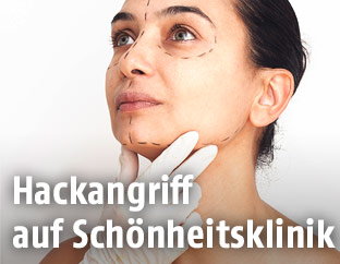 Frau mit Markierungen im Gesicht