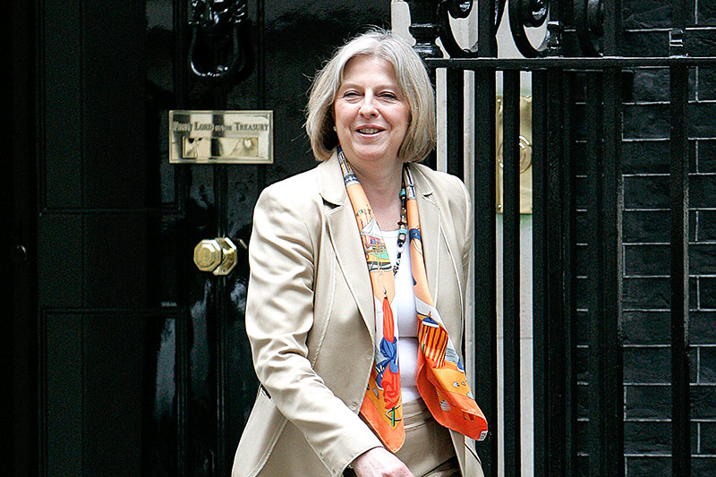 © AP/Akira Suemori Theresa May