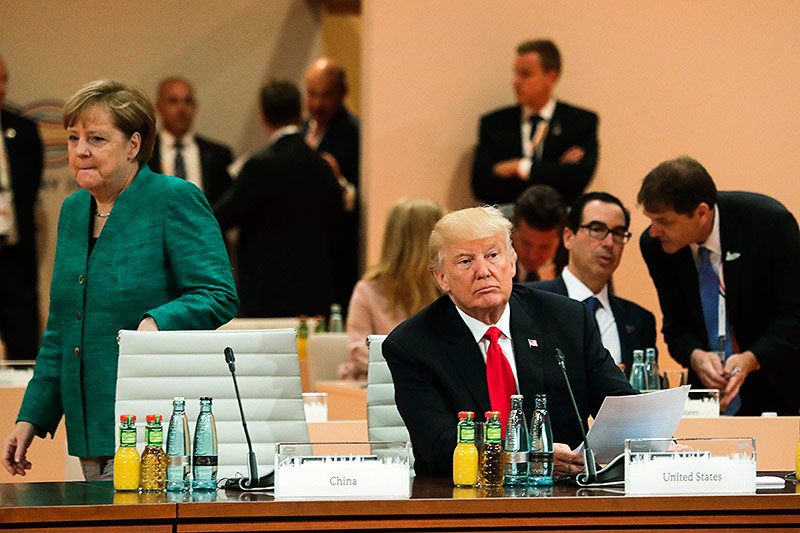 © APA/AP/Markus Schreiber Trump, Merkel