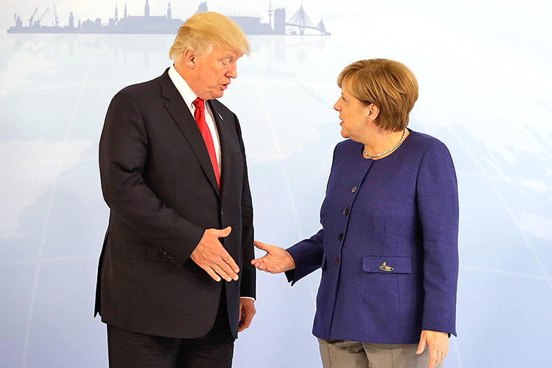 © APA/AFP/Matthias Schrader Angela Merkel und Donald Trump
