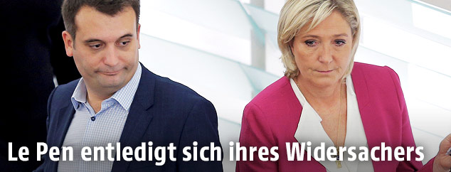 Marine Le Pen (L) and vice-president Florian Philippot