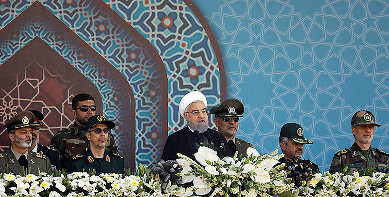 © APA/AFP Irans Präsident Hassan Rouhani hält eine Rede