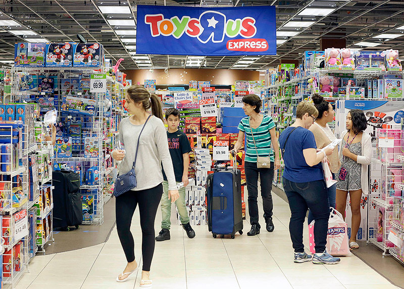 © APA/AP/Alan Diaz Menschen in einer Filiale von Toys R Us in Miami