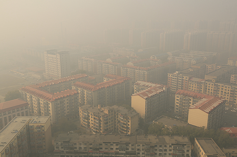 © AP/Zhang shu/Imaginechina Smog über einer chinesischen Stadt