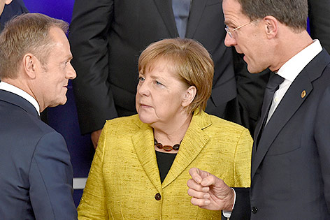 © APA/AFP/John Thys Donald Tusk, Angela Merkel und Mark Rutte