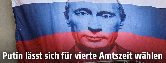 Banner zeigt den russisschen Präsidenten Wladimir Putin