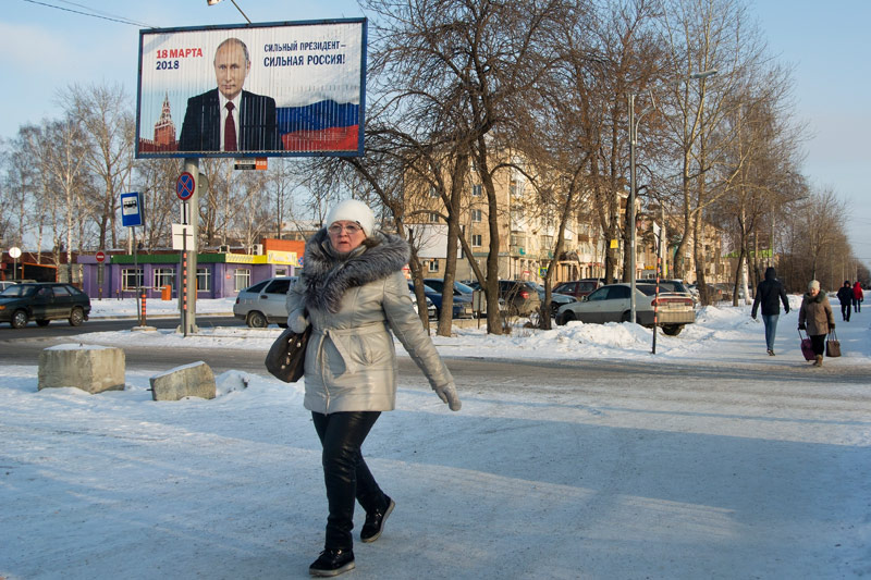 © APA/AP/Nataliya Vasilyeva Wahlplakat zeigt Präsident Wladimir Putin
