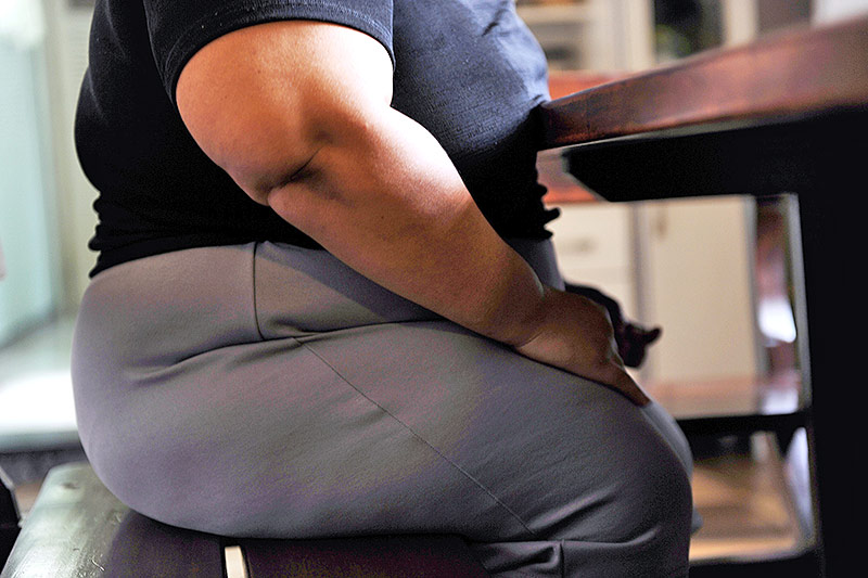© APA/AFP/Vanderlei Almeida Dicke Person am Tisch