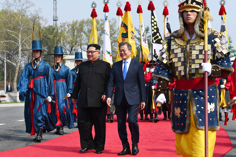 © AP Kim Jong Un AND Moon Jae-in