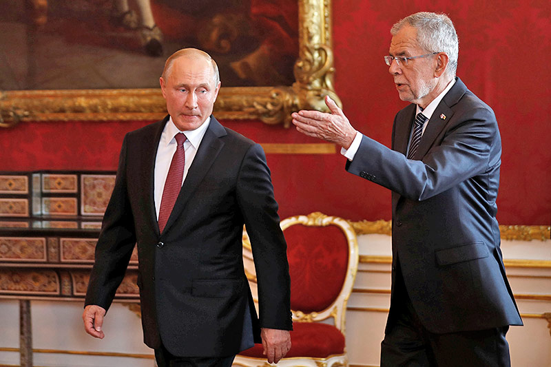 © Reuters/Leonhard Foeger Der russische Präsident Wladimir Putin und Bundespräsident Alexander Van der Bellen