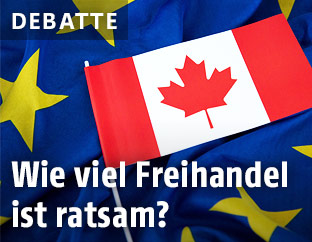 Kanada-Fahne liegt auf EU-Fahne