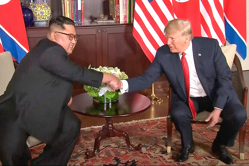 © AP/Host Broadcaster Mediacorp Pte Ltd Kim Jong Un und Donald Trump