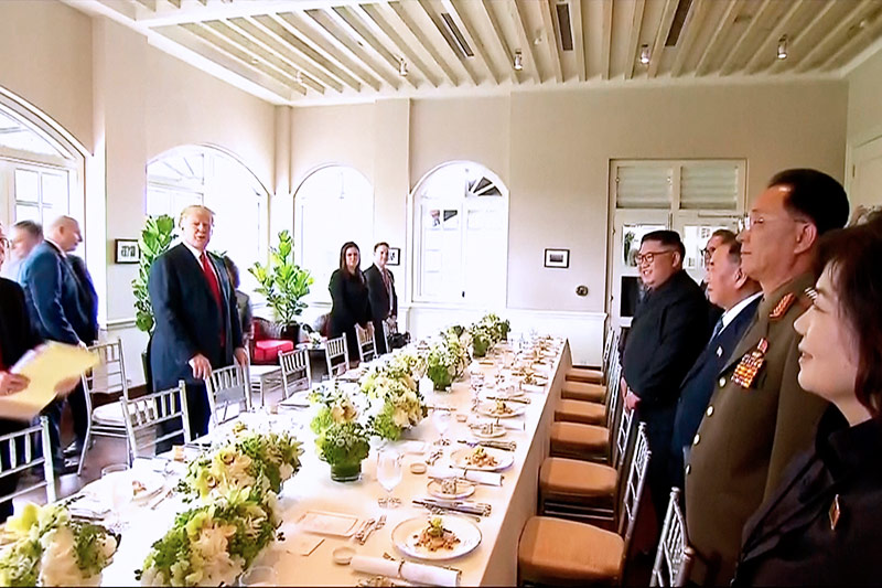 © AP/Host Broadcaster Mediacorp Pte Ltd Kim Jong Un und Donald Trump beim Essen