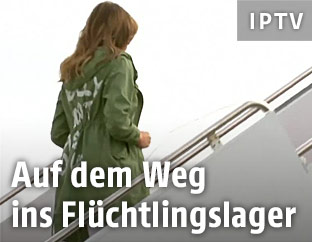 Melania Trump in einem grünen Parka