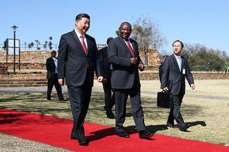 © APA/AFP/Phill Magakoe Xi Jinping und Cyril Ramaphosa